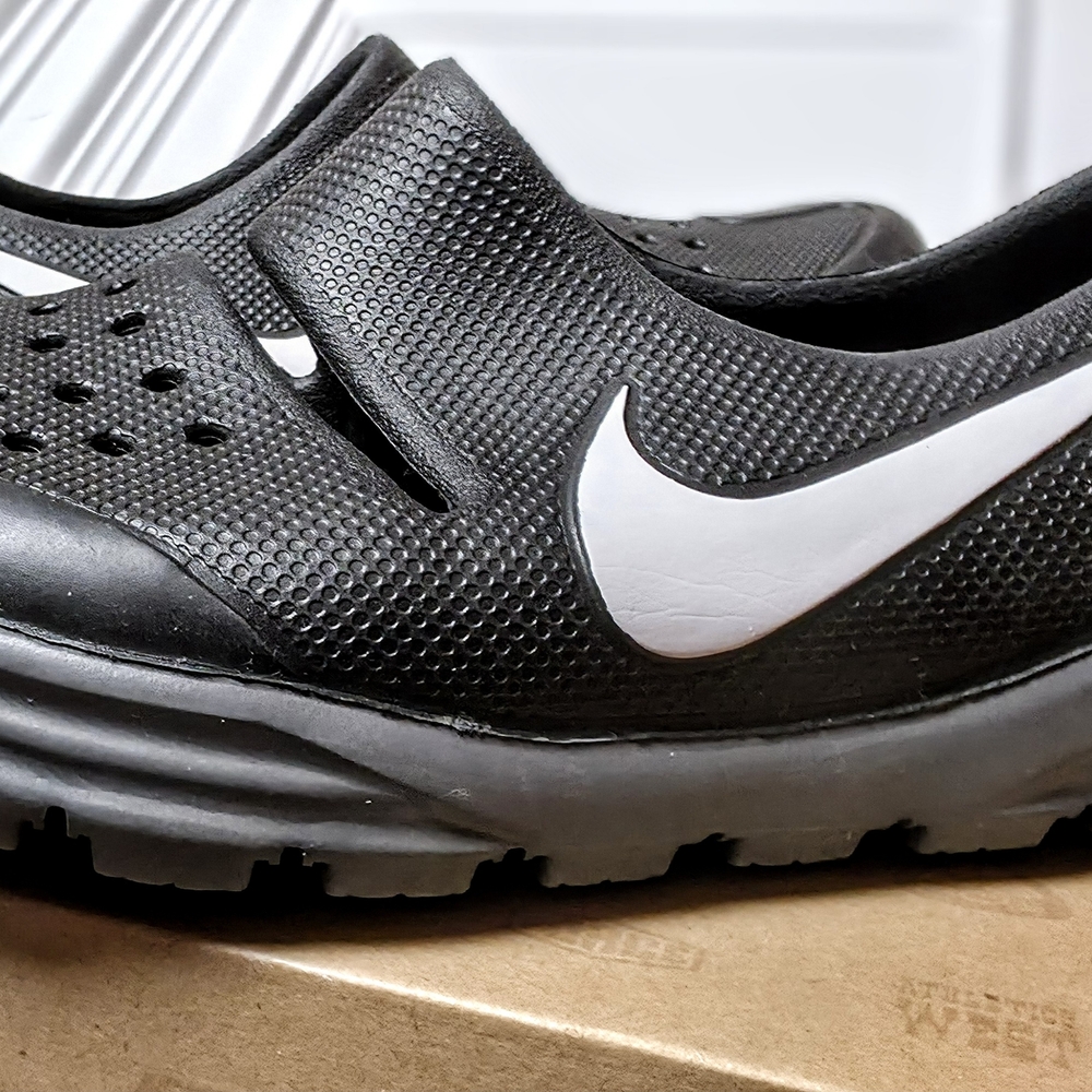 Nike Men's Black and White Slip-On Shoes